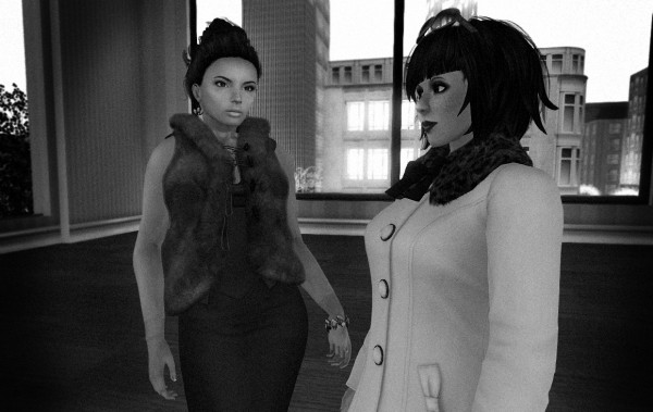 transition time: black-and-white photo of Canary Beck and Vanessa Blaylock standing in an apartment and having a conversation