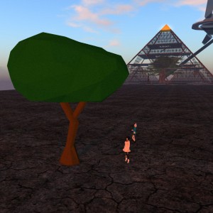 Desu's low poly tree, Vanessa, and Desu in the foreground with a very lifelike tree with many, many leaves in the background