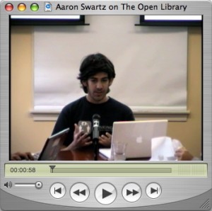 Top 5 Podcasts 2014: #3 MediaBerkman from The Berkman Center for Internet and Society at Harvard University. Image of a video player with a video of Aaron Swartz speaking on The Open Library