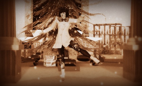 sepia-toned photo of Vanessa Blaylock ice skating and doing a pirouette in celebration of the Reply Post!