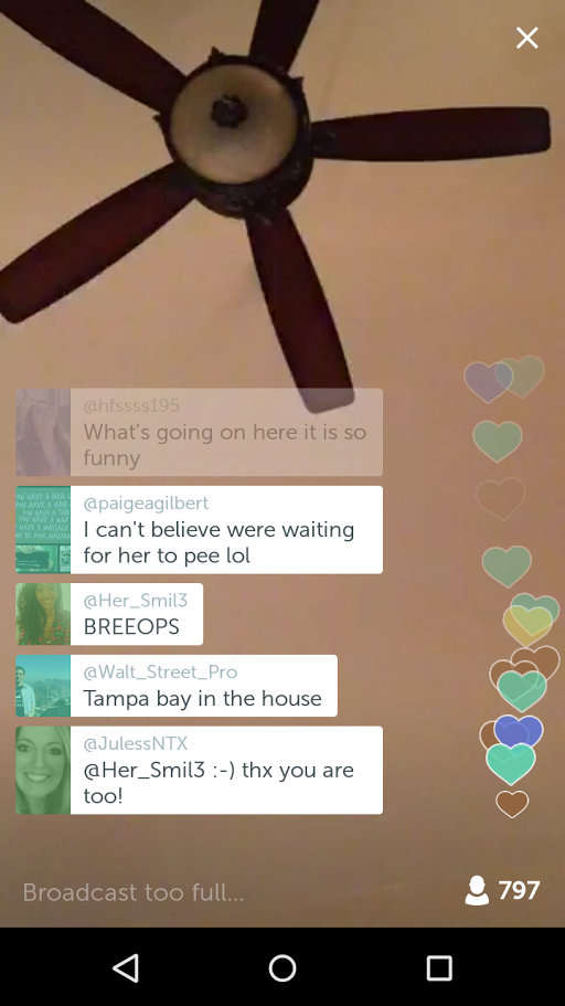Screen Cap of Bree Olson's Periscope broadcast. Her phone is on the bed and points up showing a large ceiling fan with no sign of Olson. In viewer chat @paigeagilbert writes, "I can't believe we're waiting for her to pee, lol"