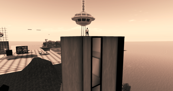 Standing on top of Olive's Apartment Tower with Chris Craft's Space Needle in the distance behind me.