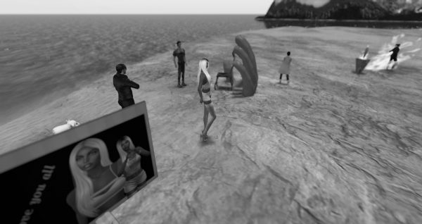 black and white photo of avatars working on the beach at Love Beach at LEA1 in Second Life