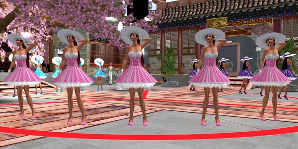 5 avatars in identical "Peggy Sue" latex dresses stand under a cherry tree and a countdown timer at Chinese College, Monash University