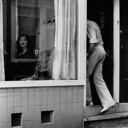 Role Exchange Challenge: black and white photo of Marina Abramovic in a window in the Amsterdam Red Light District on 2 July 1975